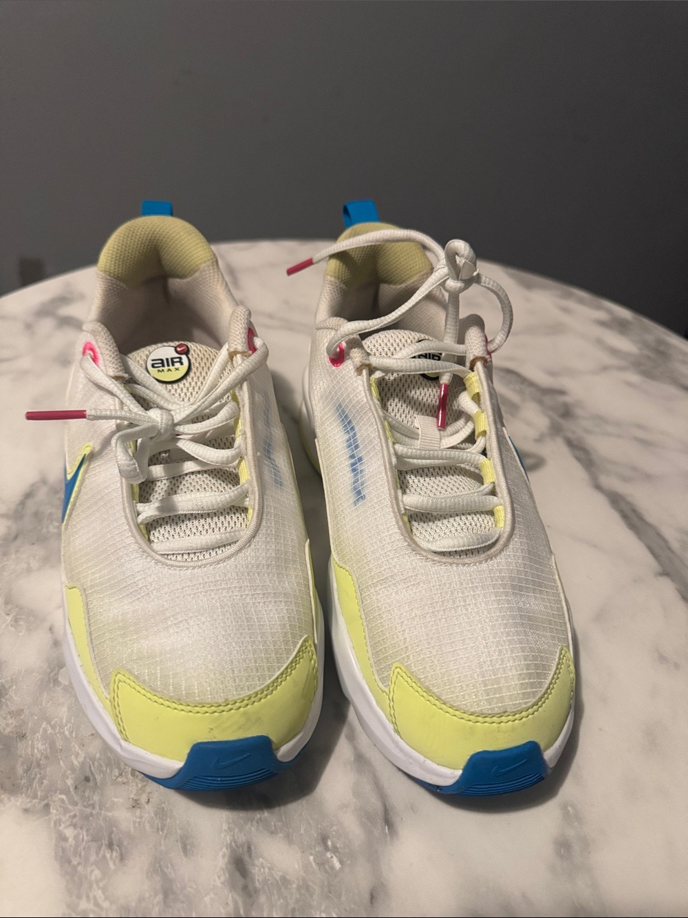 Nike Kids White Sneakers with Yellow and Blue Accents